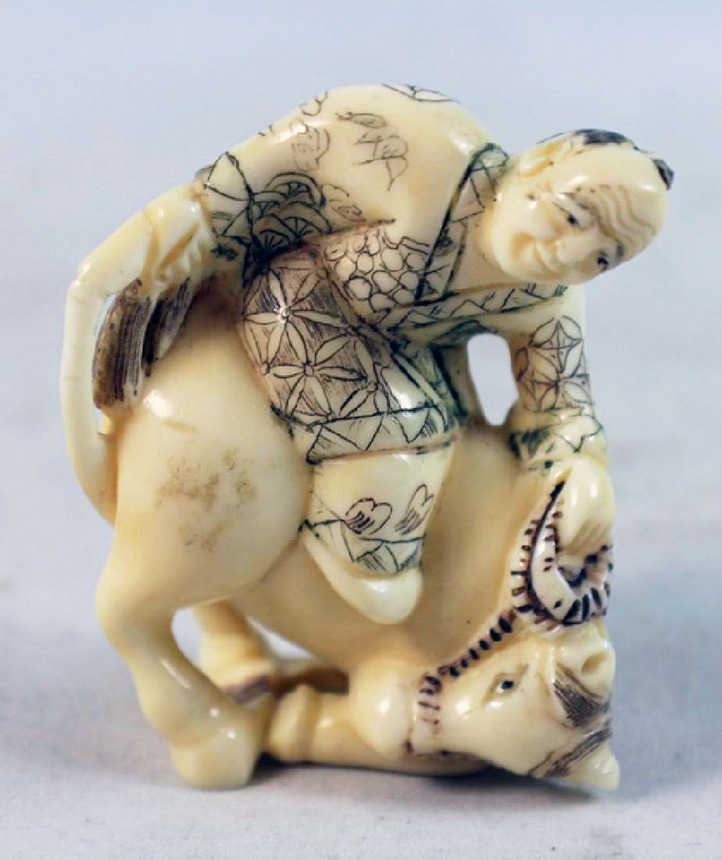 19th Century Japanese Netsuke Man Riding Bull