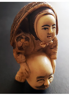 19th Century Japanese Netsuke Boy with Mask