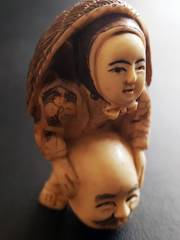 19th Century Japanese Netsuke Boy with Mask 19th Century Japanese Netsuke Boy with Mask